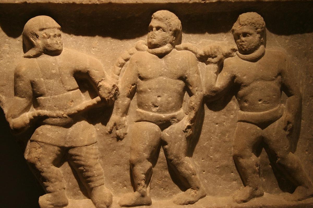 1280px-Roman_collared_slaves_-_Ashmolean_Museum.jpg